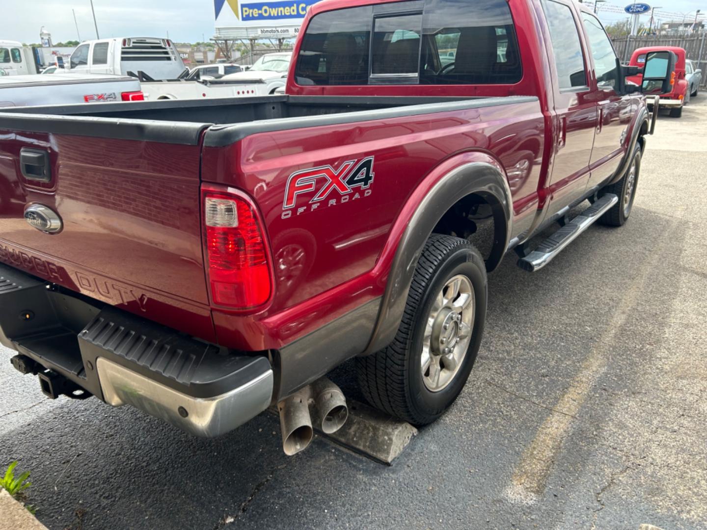 2015 Red Ford F-250 SD King Ranch Crew Cab 4WD (1FT7W2BT8FE) with an 6.7L V8 OHV 16V DIESEL engine, 6-Speed Automatic transmission, located at 1687 Business 35 S, New Braunfels, TX, 78130, (830) 625-7159, 29.655487, -98.051491 - Photo#2